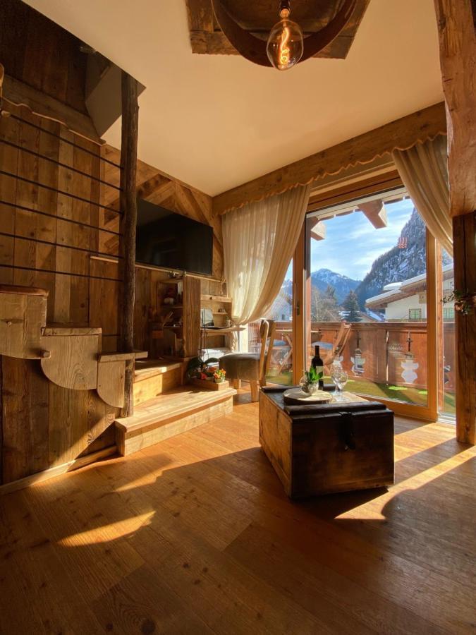 Calore Di Una Casa Di Montagna Кампитело ди Фаса Екстериор снимка